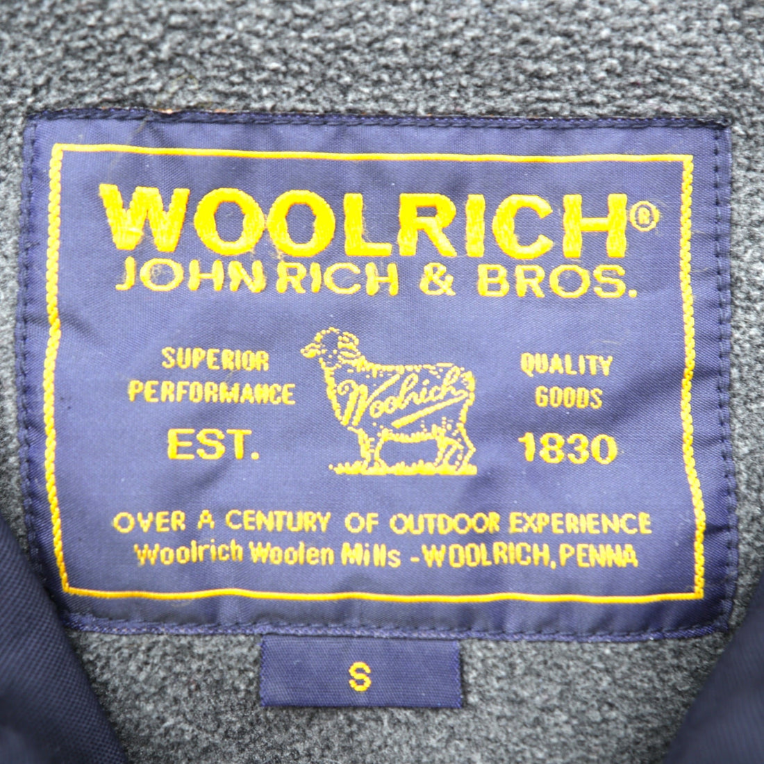 Woolrich ハーフジップ アノラックパーカー ナイロンジャケット L ネイビー ドローコード カンガルーポケット 中綿 サイドジップ スリット