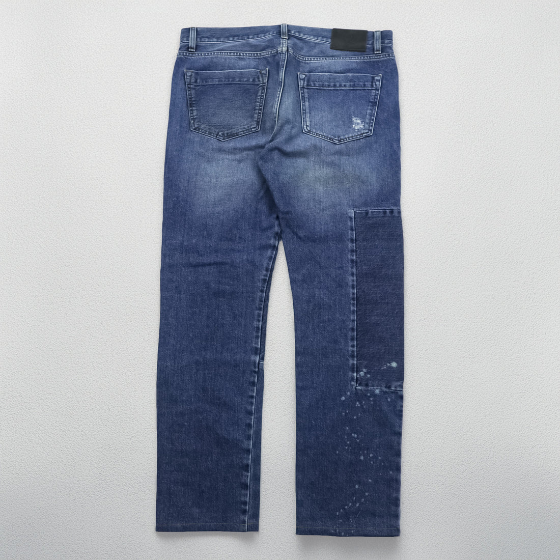 Alexander McQueen Italian-made distressed denim jeans, size L, blue, skinny fit.