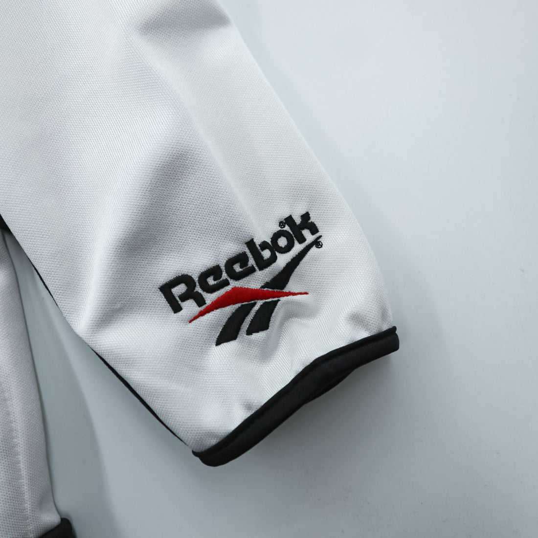 Reebok 90年代 日本製 トラックジャケット ジャージ M ホワイト ブラック スタンドカラー ベクターロゴ 刺繍