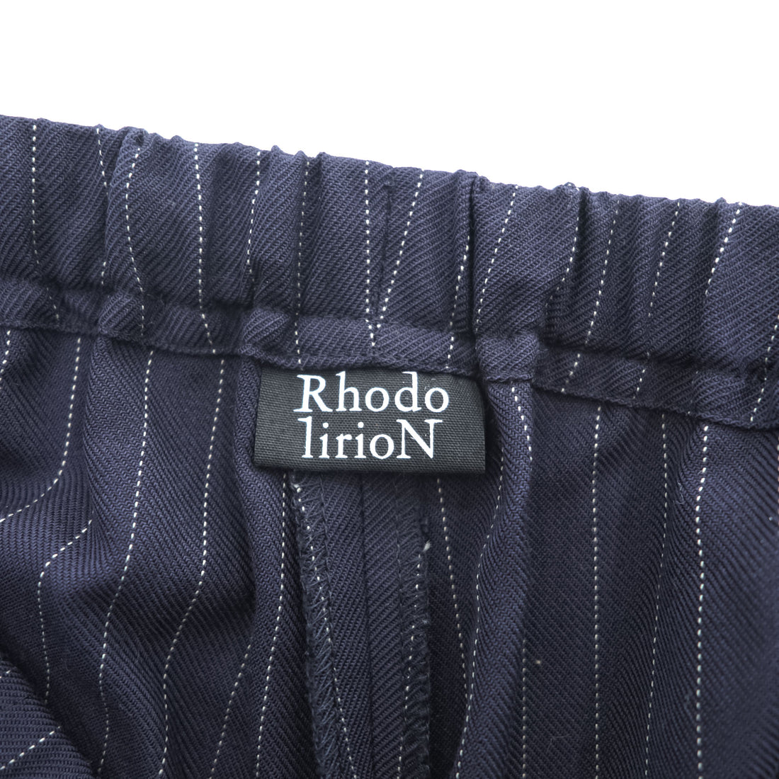 RHODOLIRION (NEPENTHES) フリルサイド ストライプパンツ Frill Side Stripe Pants スラックス イージーパンツ ネイビー ギャバジン NQ974