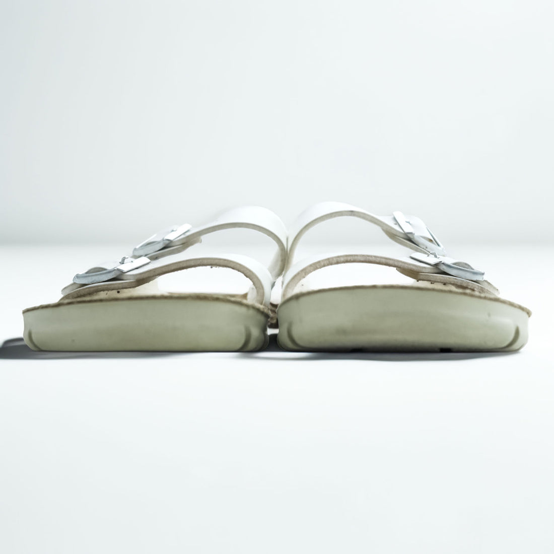BIRKENSTOCK German-made sandals, US size 8.5, white, Arizona.