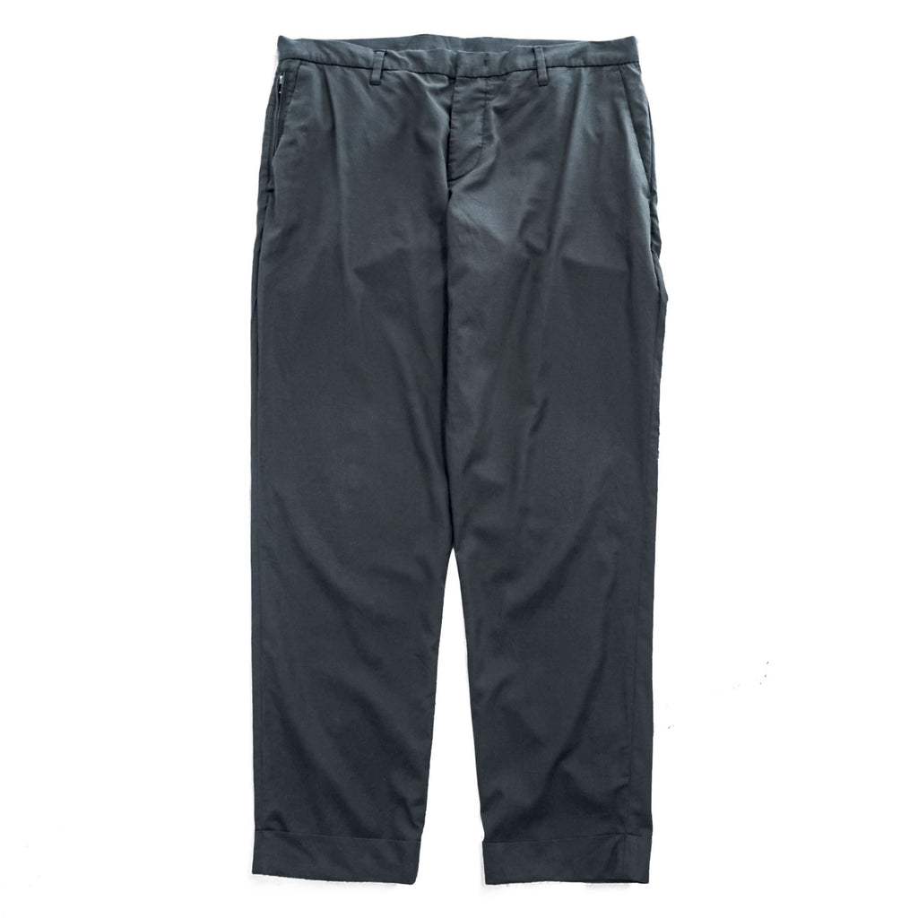 Emporio Armani 7V1PN8 trousers black cotton-blend tapered pleated button-fly side-zip pockets back welt zip EA metal logo cuff 2021 EU52