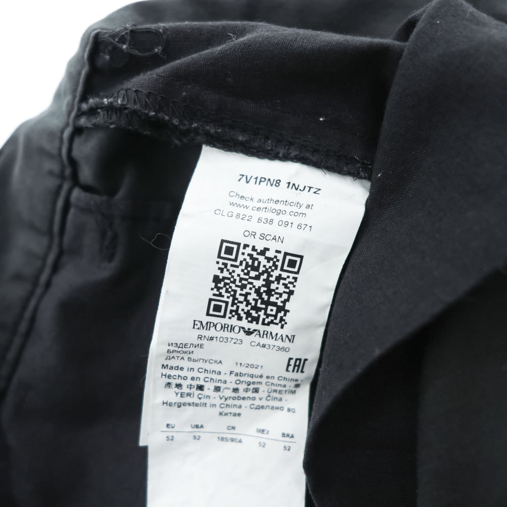 Emporio Armani 7V1PN8 trousers black cotton-blend tapered pleated button-fly side-zip pockets back welt zip EA metal logo cuff 2021 EU52