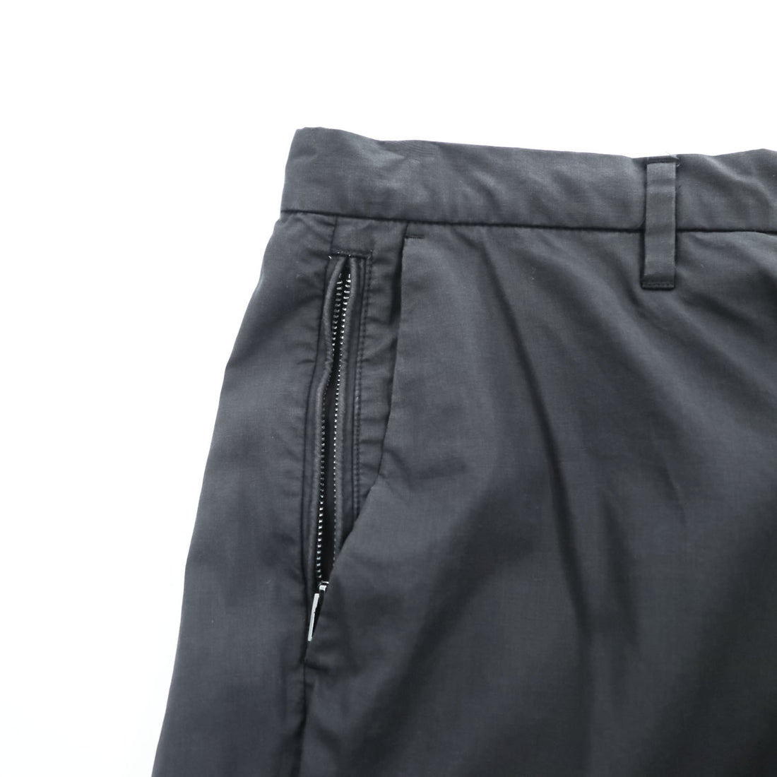 Emporio Armani 7V1PN8 trousers black cotton-blend tapered pleated button-fly side-zip pockets back welt zip EA metal logo cuff 2021 EU52