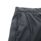 Emporio Armani 7V1PN8 trousers black cotton-blend tapered pleated button-fly side-zip pockets back welt zip EA metal logo cuff 2021 EU52