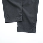 Emporio Armani 7V1PN8 trousers black cotton-blend tapered pleated button-fly side-zip pockets back welt zip EA metal logo cuff 2021 EU52