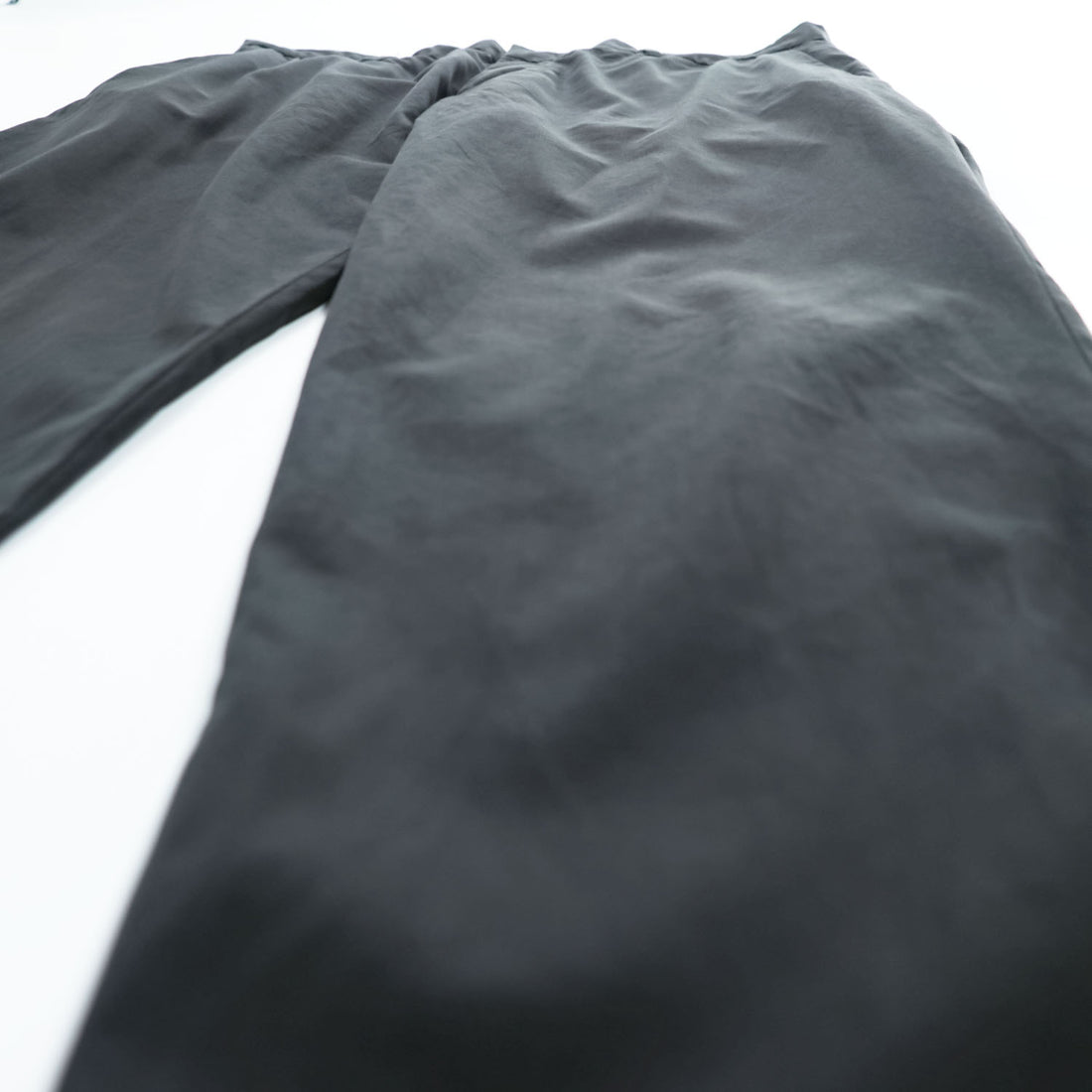 Emporio Armani 7V1PN8 trousers black cotton-blend tapered pleated button-fly side-zip pockets back welt zip EA metal logo cuff 2021 EU52