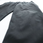 Emporio Armani 7V1PN8 trousers black cotton-blend tapered pleated button-fly side-zip pockets back welt zip EA metal logo cuff 2021 EU52