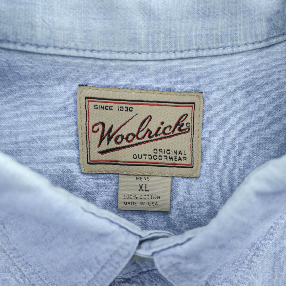 Woolrich 90s USA Made Vintage short sleeve chambray shirt light blue 100% cotton button-down chest flap pockets x2 back box pleat Made in USA XL