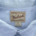 Woolrich 90s USA Made Vintage short sleeve chambray shirt light blue 100% cotton button-down chest flap pockets x2 back box pleat Made in USA XL