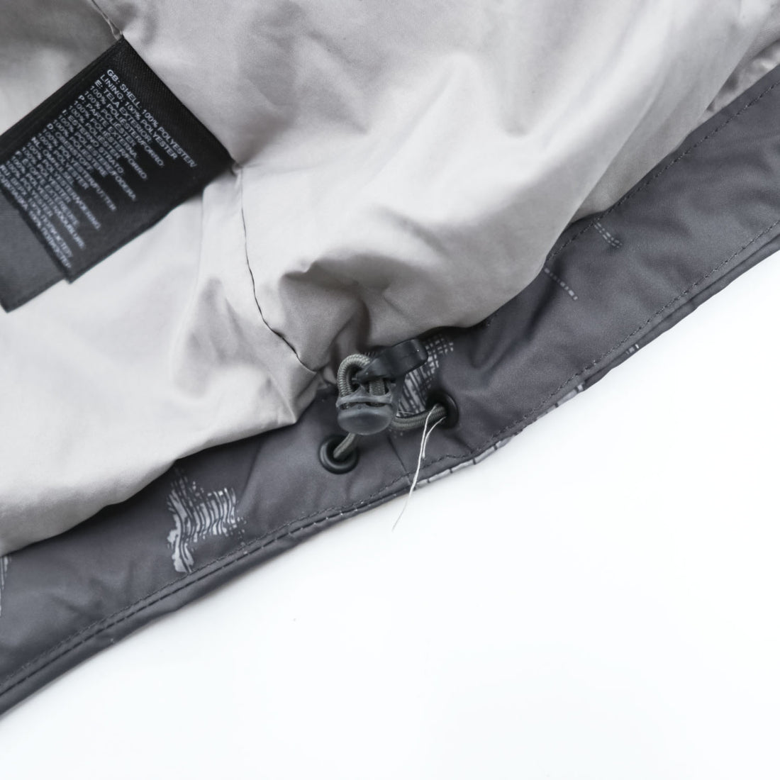 THE NORTH FACE マウンテンパーカー DRYVENT 防水 シェル レインジャケット XS グレー 総柄 ドローコード 透湿 NF00CG0P