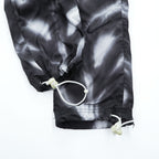 FEAR OF GOD × NIKE トラックパンツ ALLOVER PRINT PANTS ジャージ M ブラック グレー 総柄 ドローコード BV8737-010