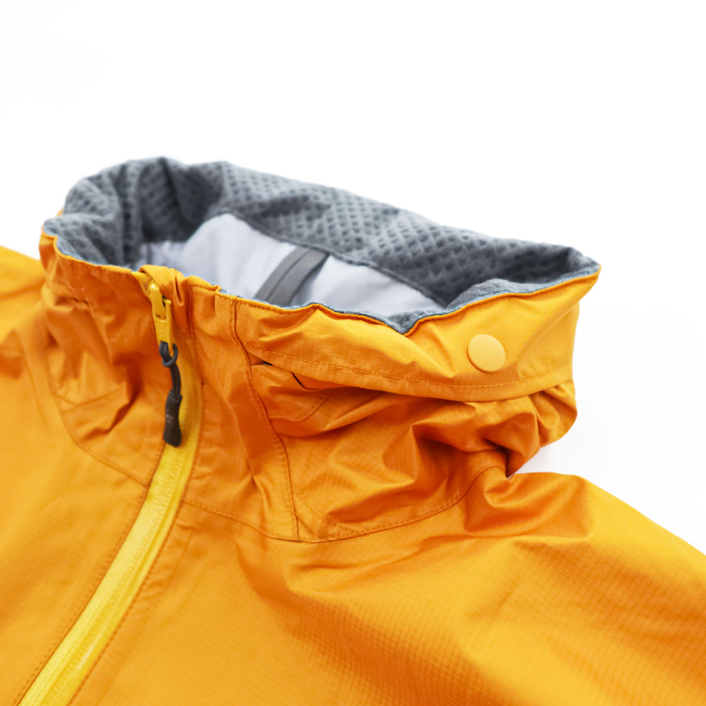 mont-bell ゴアテックス GORE-TEX 防水 マウンテンパーカー シェル レインジャケット L オレンジ ストームクルーザー ドローコード フード収納 1128256