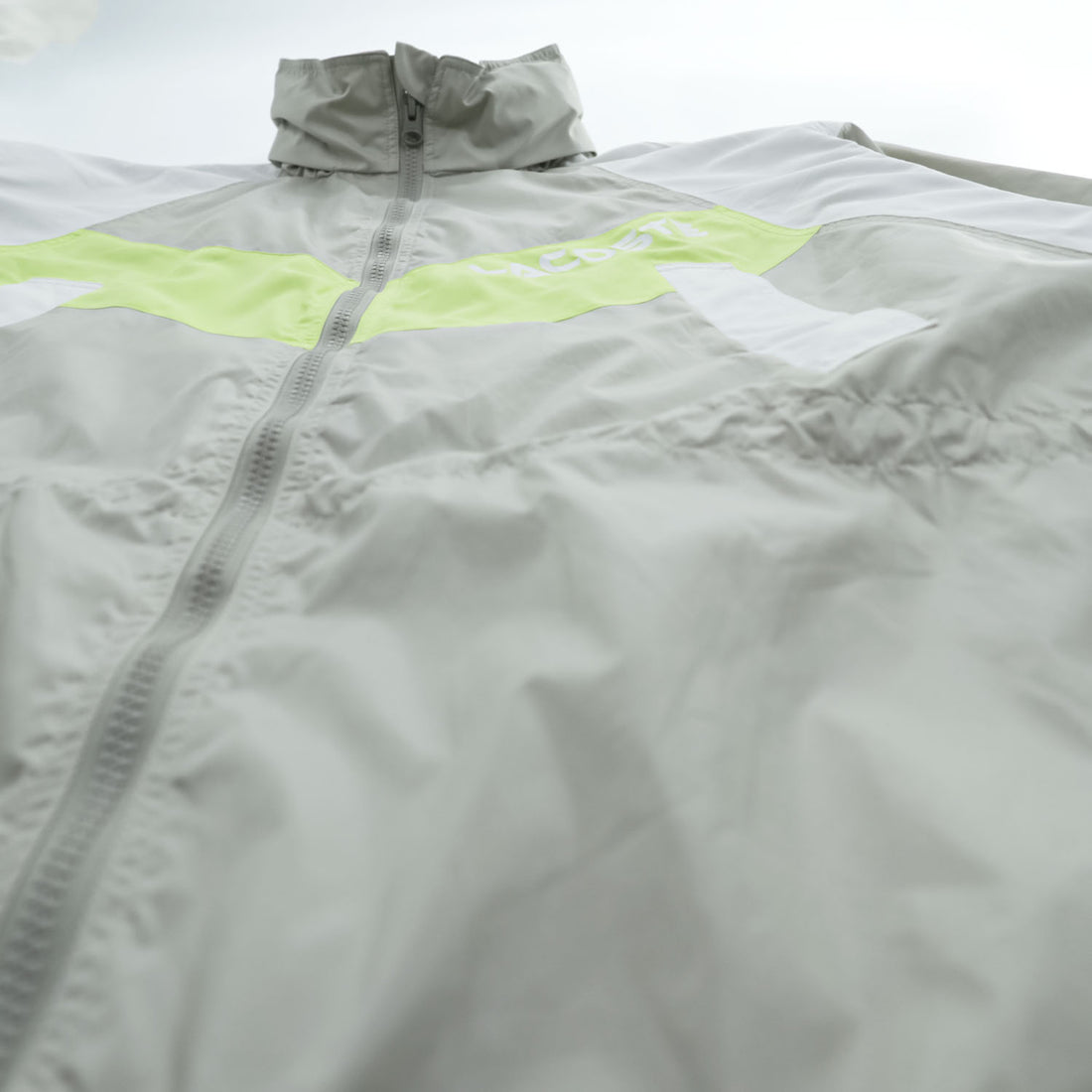 LACOSTE SPORT カラーブロック フーデッド ウインドブレーカー XL イエロー グレー メッシュ ドローコード フード収納式 BF1567 未使用品