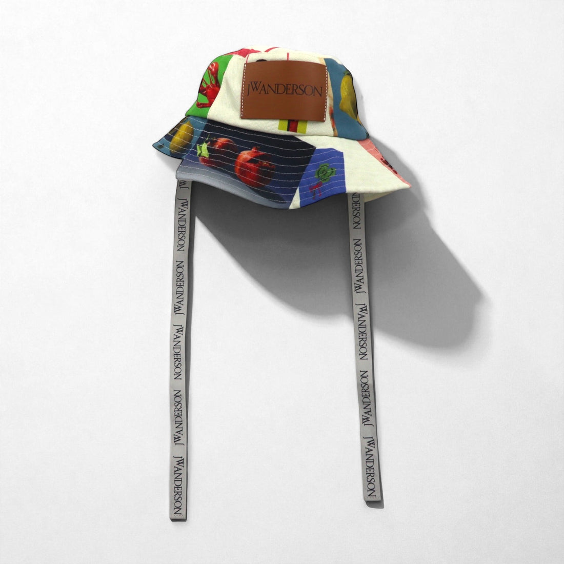 J.W.ANDERSON アシンメトリー バケットハット Asymmetric Bucket Hat マルチカラー 総柄 ロゴテープ ストラップ AC0177FA0153019