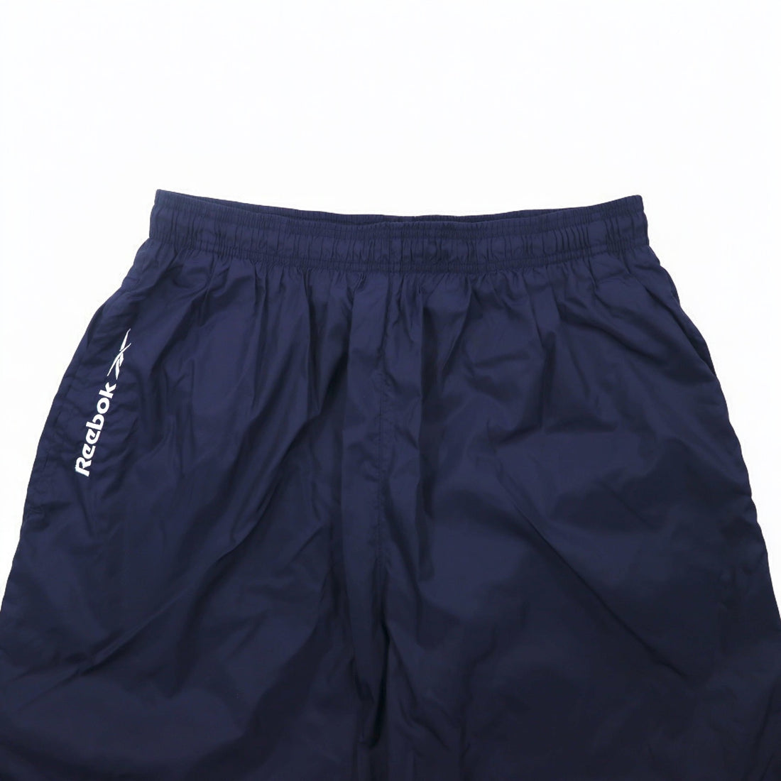 Reebok 90s nylon track pants, jersey, L, navy, vector logo embroidery, slit, zip hem