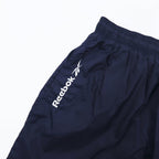 Reebok 90s nylon track pants, jersey, L, navy, vector logo embroidery, slit, zip hem