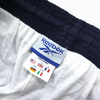 Reebok 90s nylon track pants, jersey, L, navy, vector logo embroidery, slit, zip hem