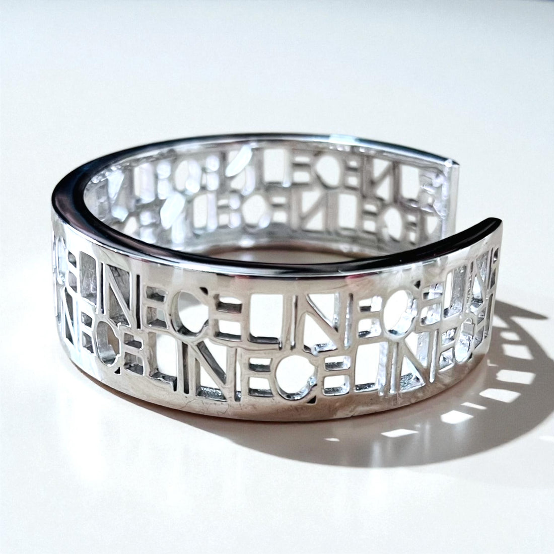 CELINE Bangle Cuff Bracelet Silver Metal Cutout Logo Openwork