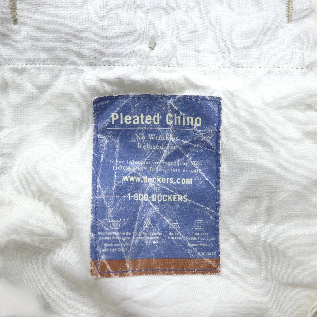 DOCKERS (Levi's) khaki pants, 2000s, wide-leg, pleated chino pants, size L, beige, cotton.