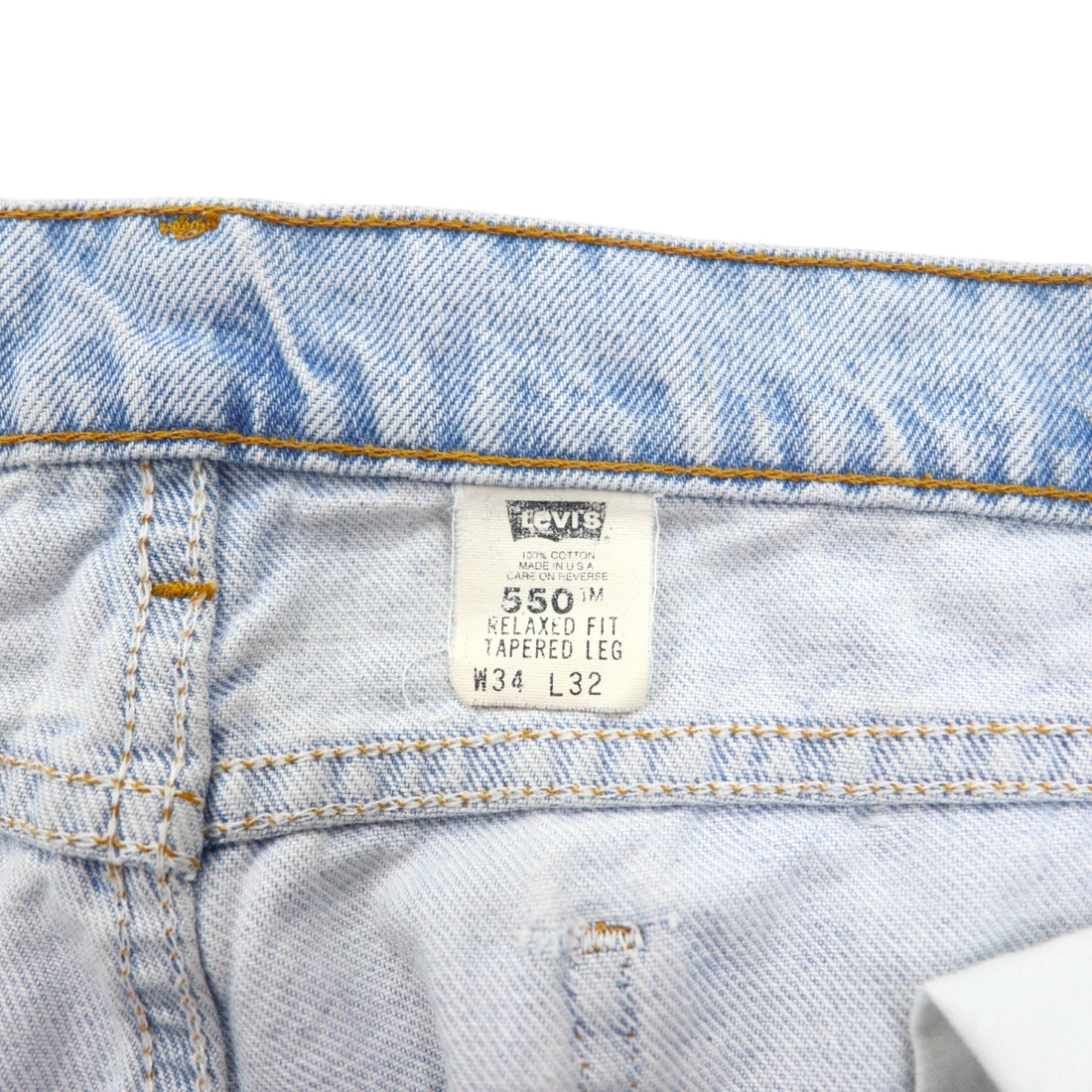Levi's USA made 550 Relaxed Fit Tapered denim pants size 34 blue cotton zipper fly orange tab