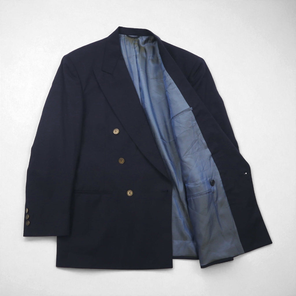 80s USA UNION MADE Vintage Blazer by NINO CERRUTI. 80s USA-made peak lapel double-breasted blazer, size L, gold buttons, Union Made ACTWU tag, navy blue.