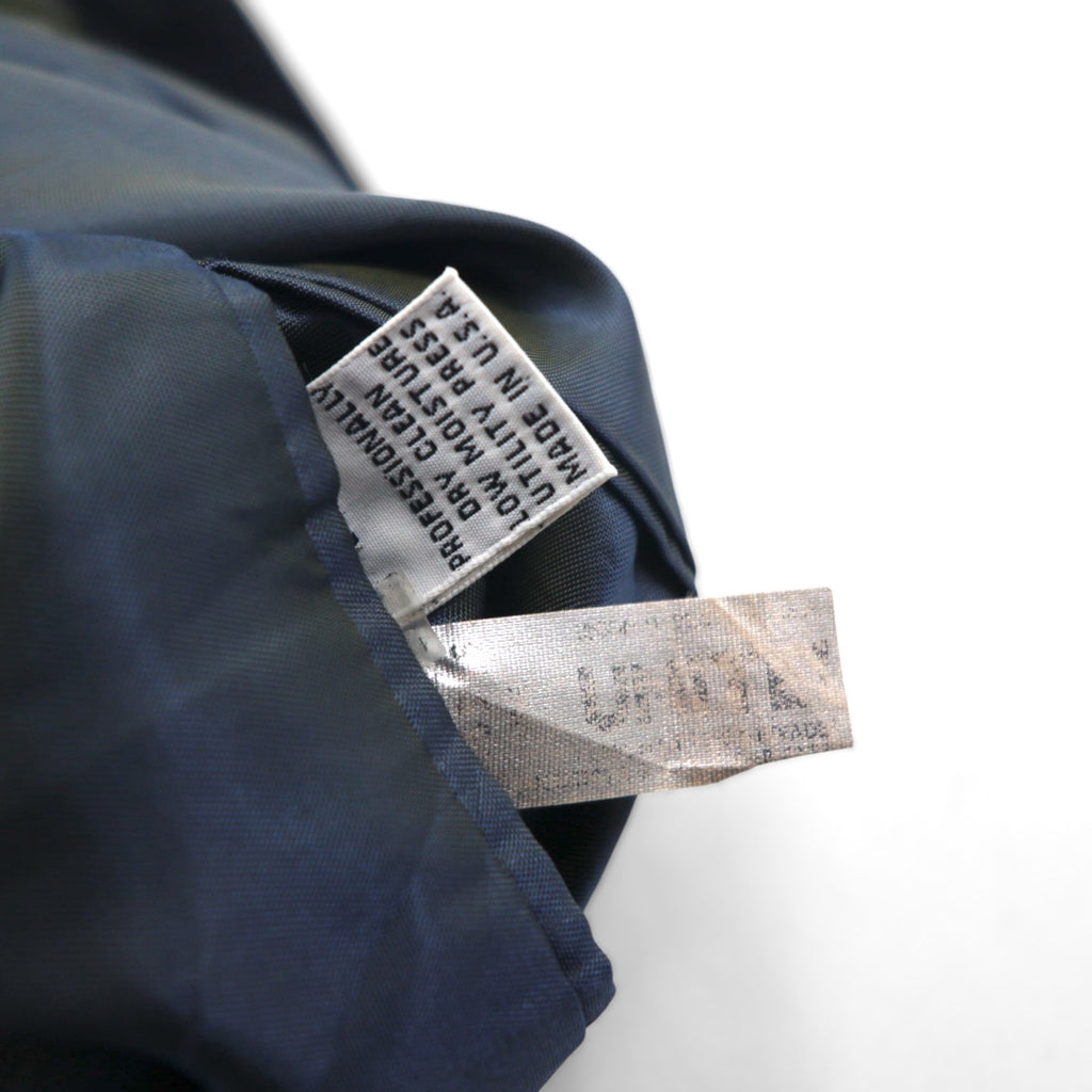 80s USA UNION MADE Vintage Blazer by NINO CERRUTI. 80s USA-made peak lapel double-breasted blazer, size L, gold buttons, Union Made ACTWU tag, navy blue.